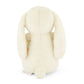 Cream-colored plush bunny toy on a white background