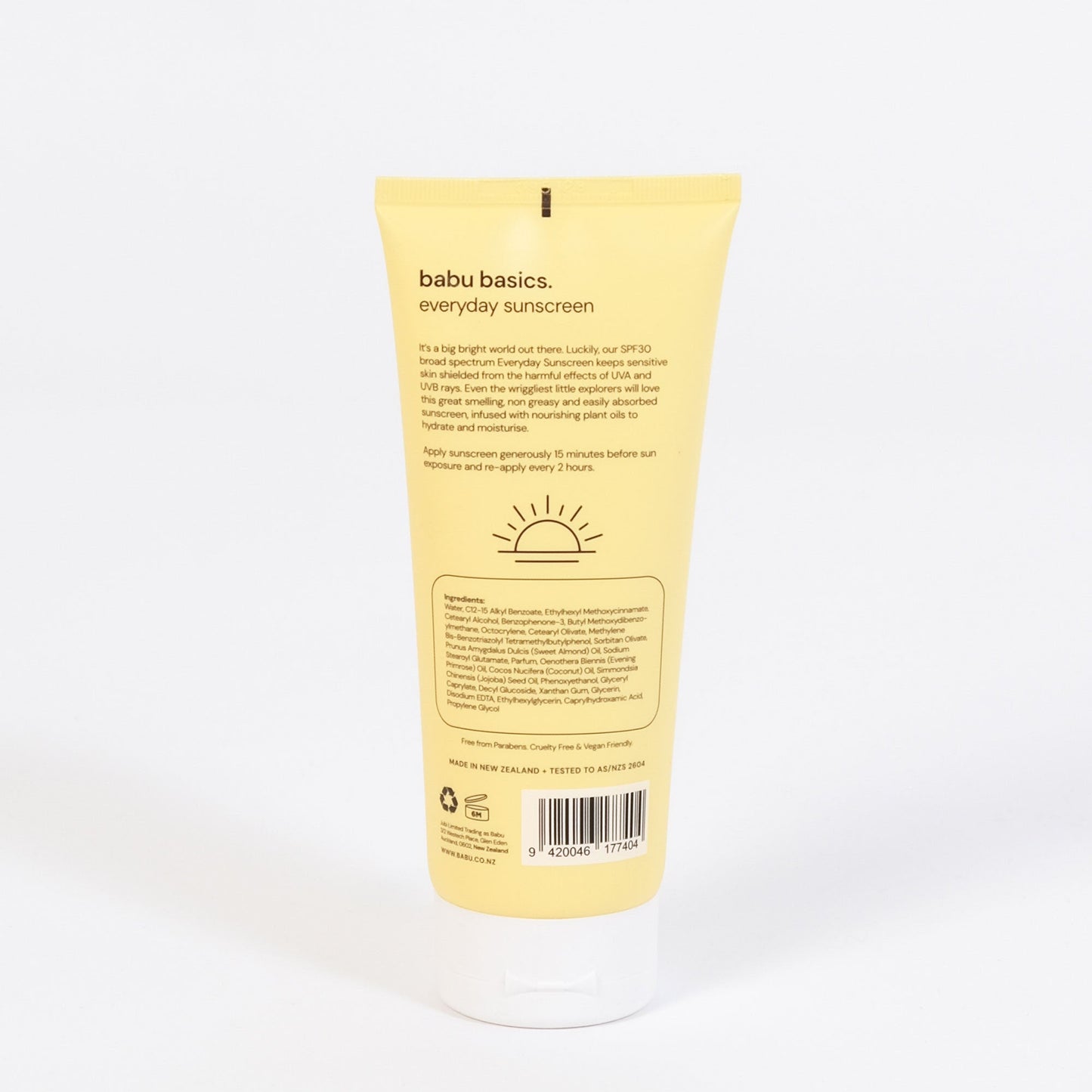 Yellow tube of babu basics everyday sunscreen on a white background