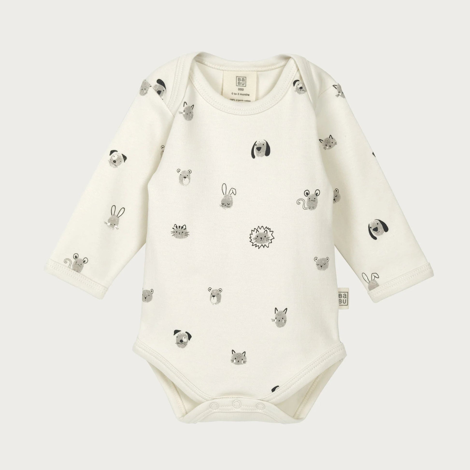 Baby onesie with animal prints on a white background