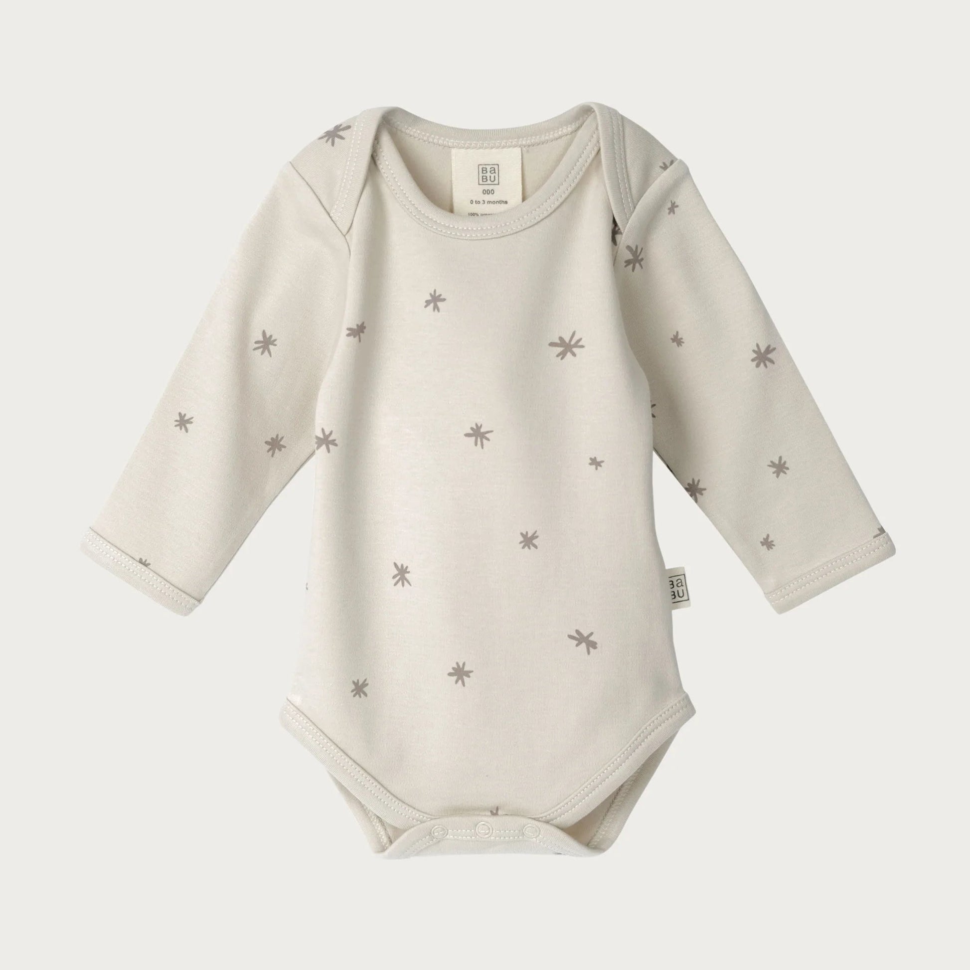 Beige baby bodysuit with star patterns on a white background