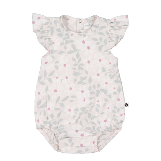 Baby romper with floral pattern on a white background