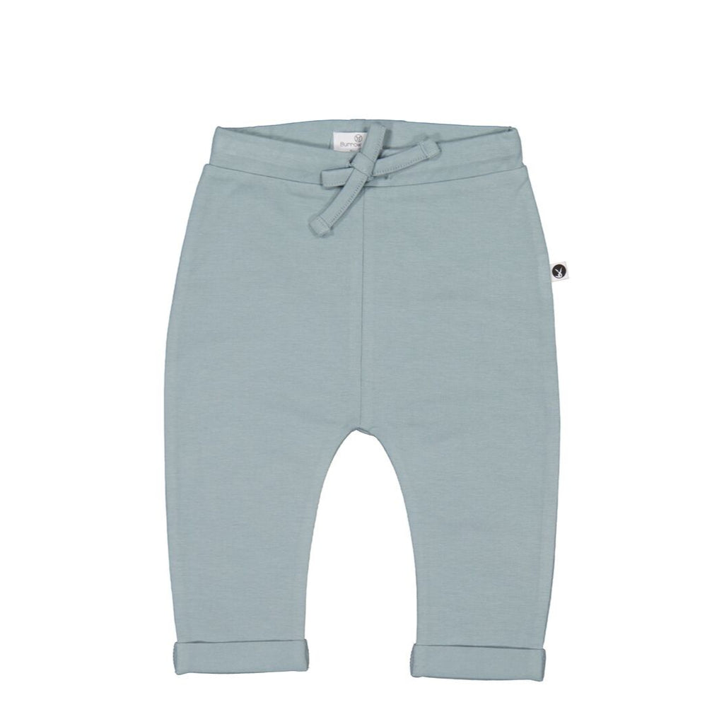 Light blue baby pants on a white background