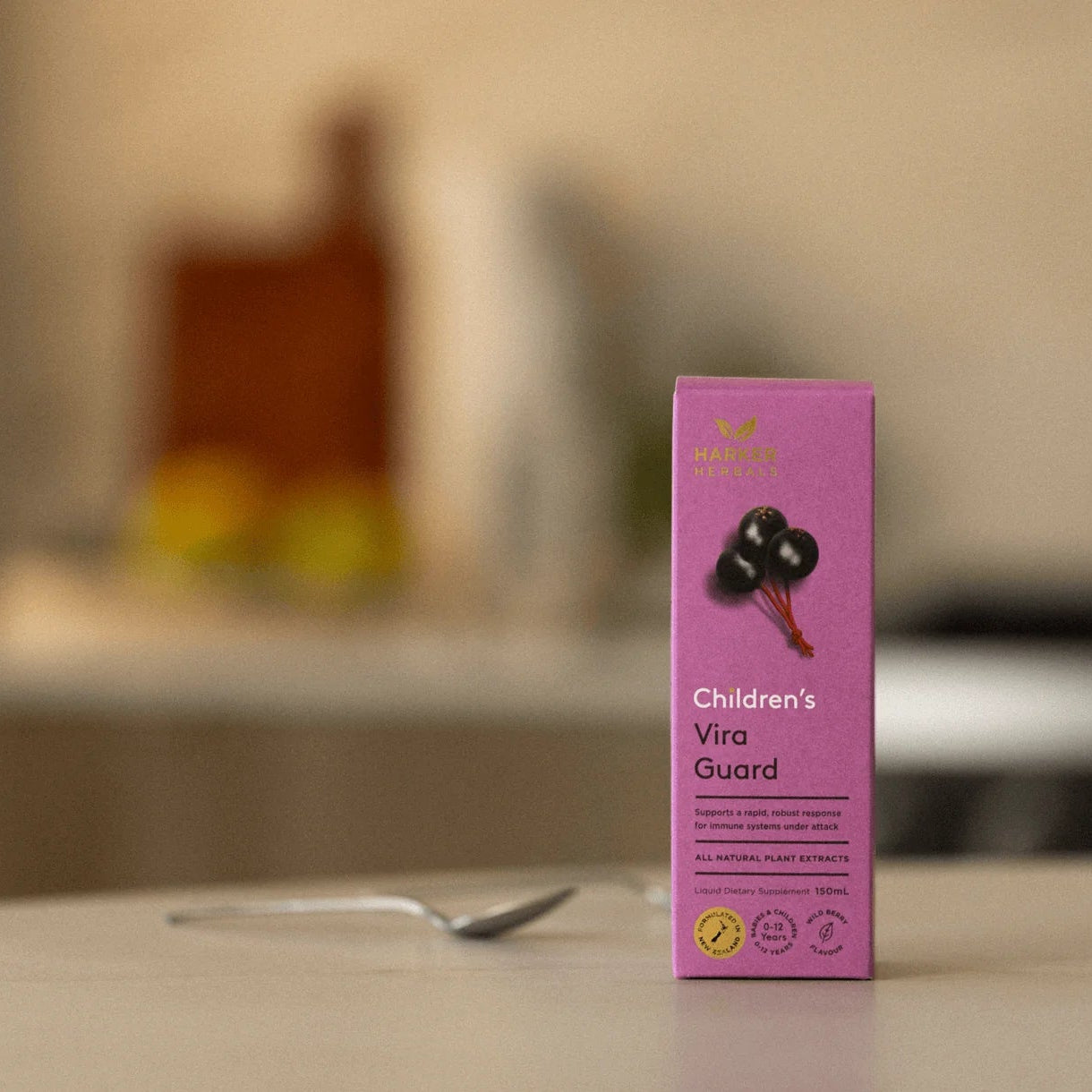 Children's Vira Guard supplement box on a table with a blurred background