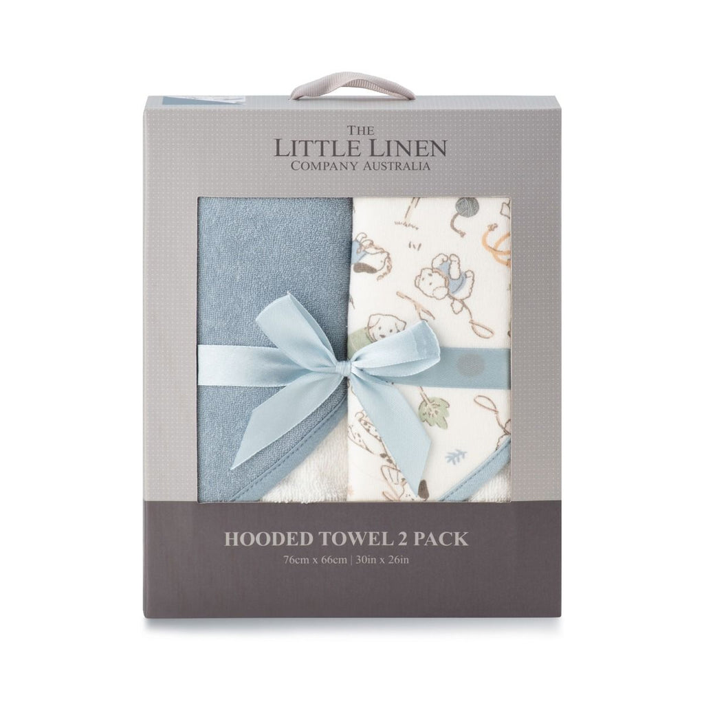 Packaged hooded towels from The Little Linen Company Australia with a bow.