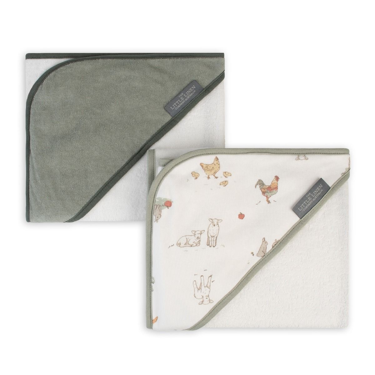Two hooded towels, one green and one with farm animal pattern, on a white background.