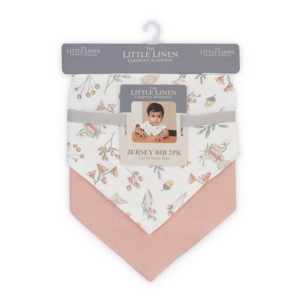 Packaged jersey bibs with floral pattern and pink trim, featuring 'The Little Linen Company Australia' branding.