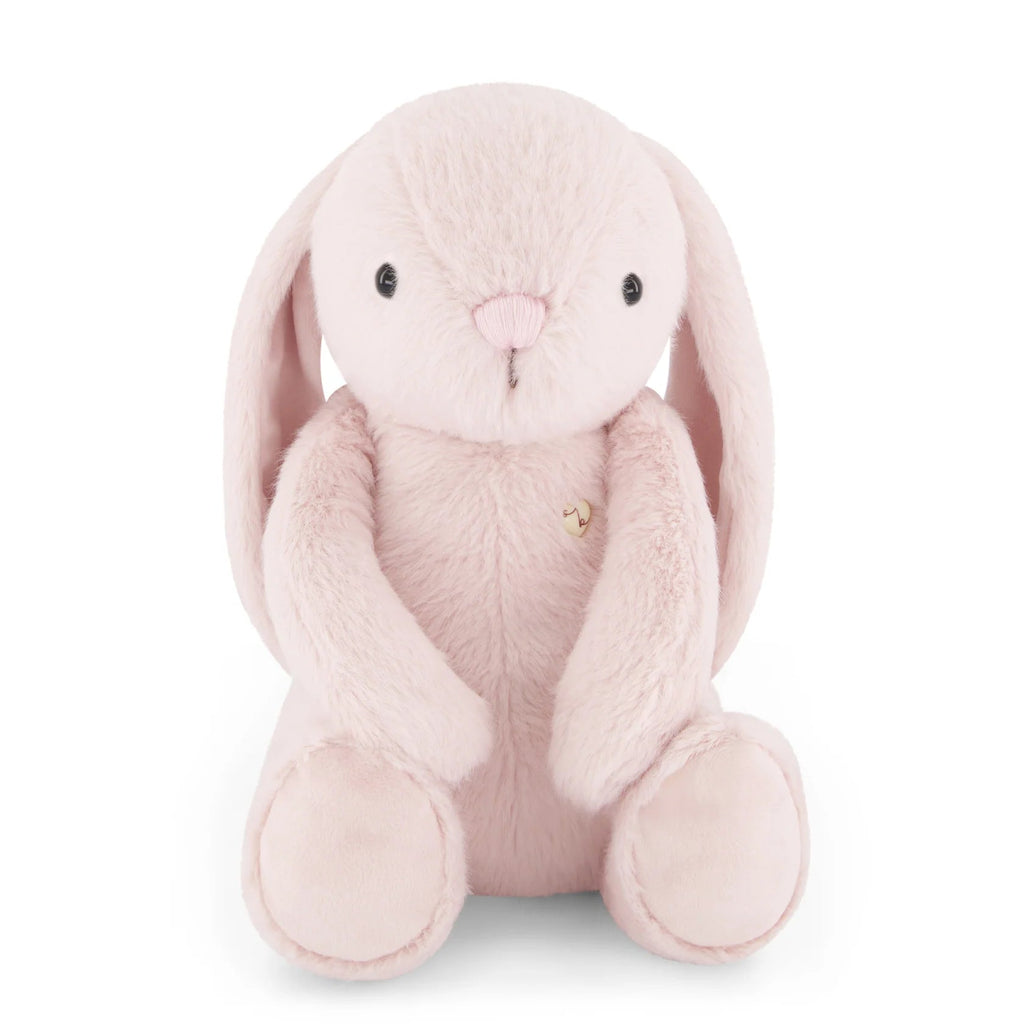 Pink plush bunny toy on a white background
