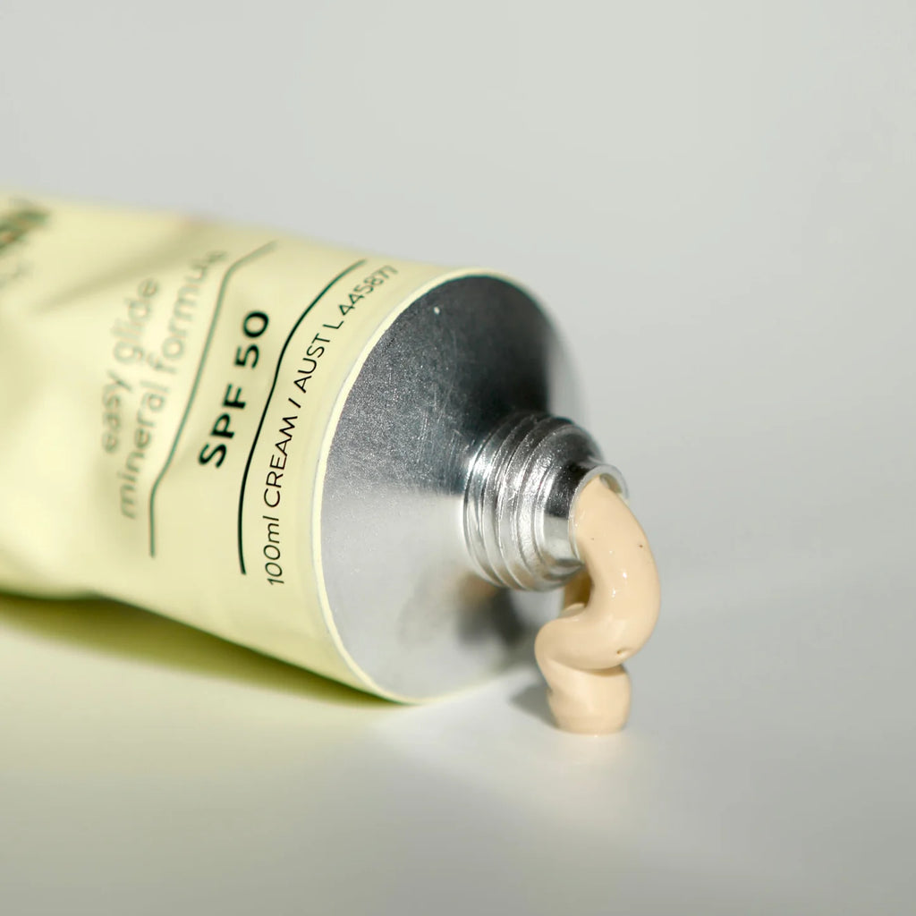 Tube of sunscreen cream with a clear background