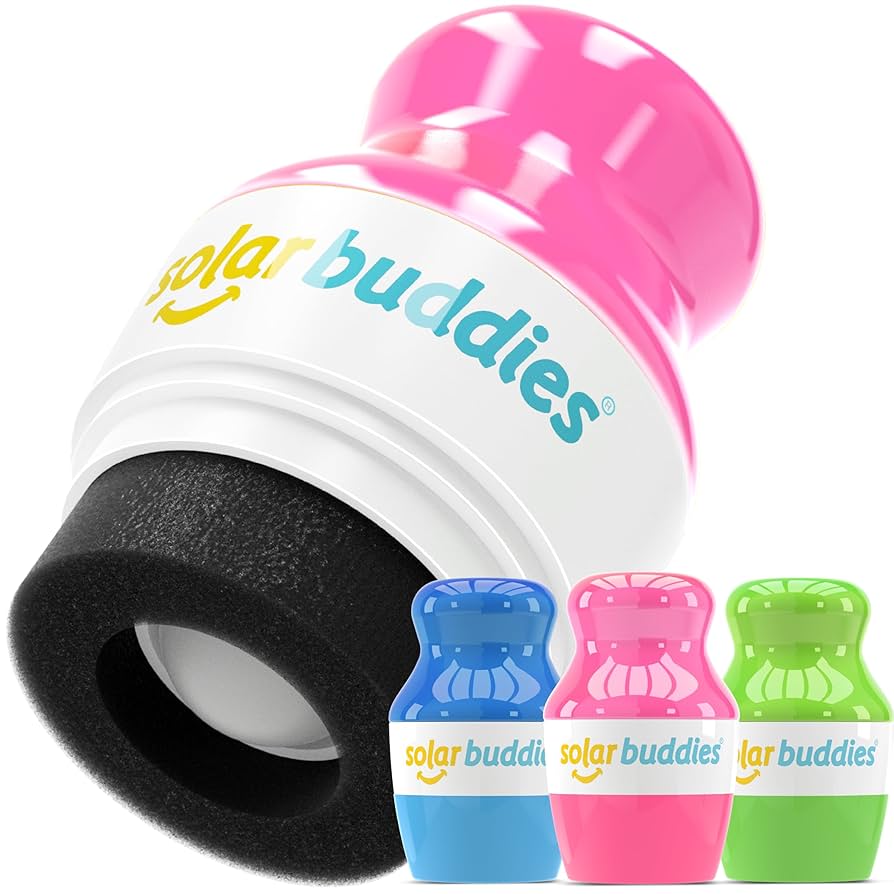 Solar Buddies toy with pink top and black sponge bottom and roller ball on a white background