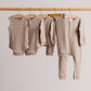 Woolbabe Organic Cotton & Merino Long Sleeve Henley Bodysuit